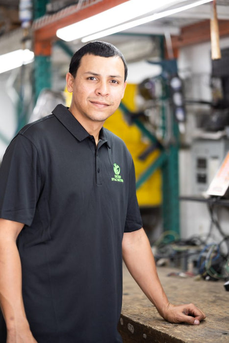 United HVAC Motors technician at the shop workbench