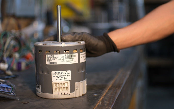 Remanufactured Genteq ECM blower motor at the United HVAC Motors shop in Tampa, Florida