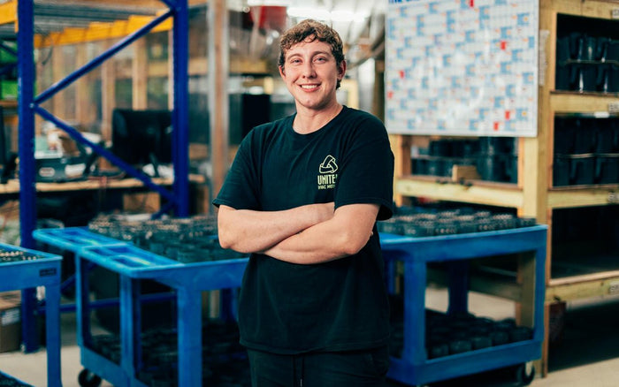 United HVAC Motors team member in the blower motor warehouse